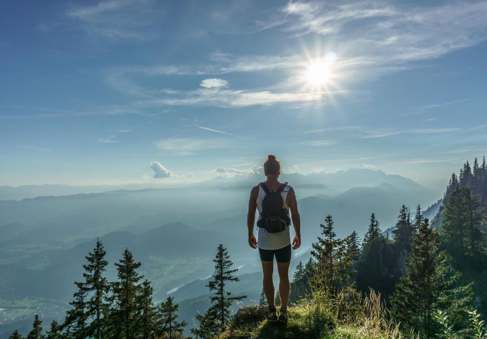 Home Man-looking-over-over-mountain-valley